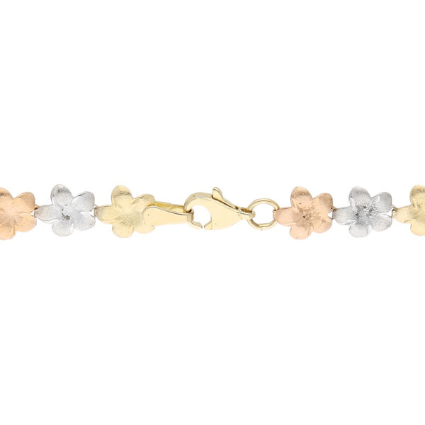 Pulsera eslabón articulado motivo flor en oro tres tonos 14 kilates.