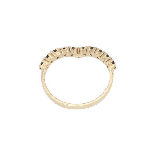Anillo estilizado con sintéticos en oro amarillo 14 kilates.