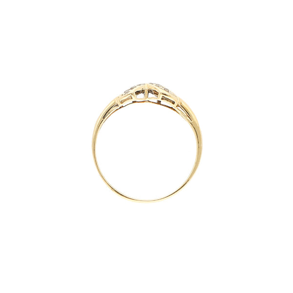 Anillo diseño especial con sintéticos en oro amarillo 12 kilates.