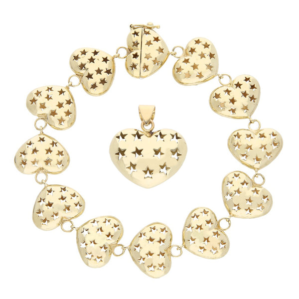 Juego de dije y pulsera calados motivo corazón en oro amarillo 14 kilates.