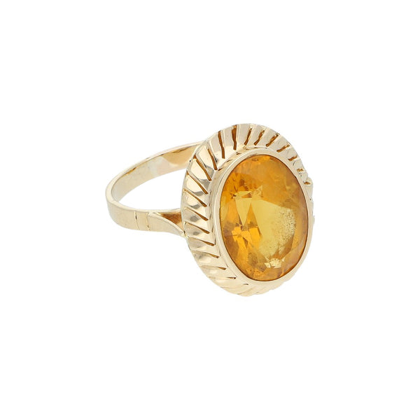 Anillo diseño especial con sintéticos en oro amarillo 14 kilates.