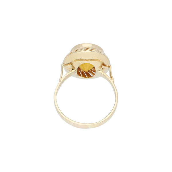 Anillo diseño especial con sintéticos en oro amarillo 14 kilates.