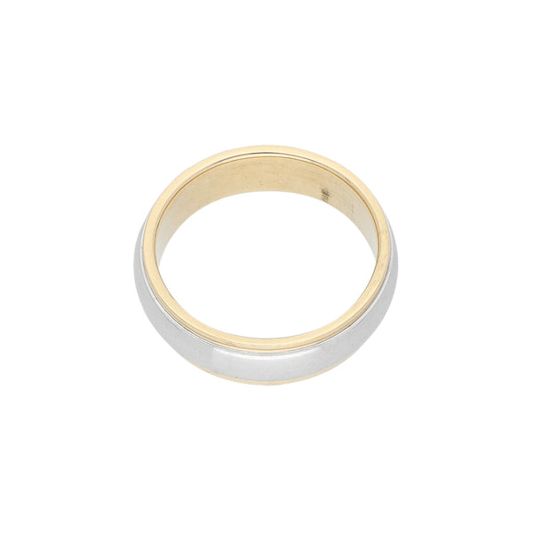 Argolla lisa firma Tiffany & Co. en platino y oro amarillo 18 kilates.