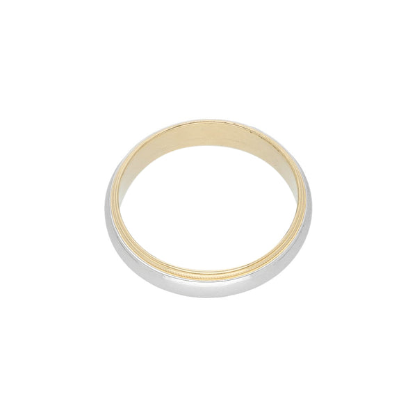 Argolla lisa firma Tiffany & Co. en platino y oro amarillo 18 kilates.