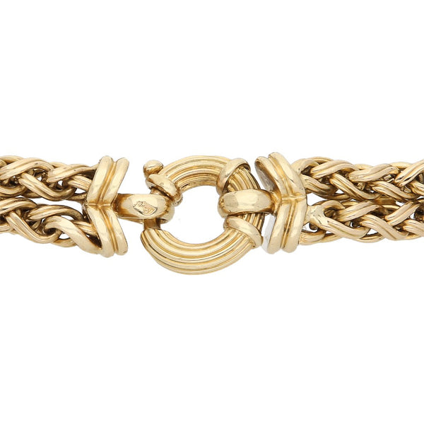 Pulsera de dos hilos eslabón tejido con aplicaciones y sintéticos en oro amarillo 14 kilates.