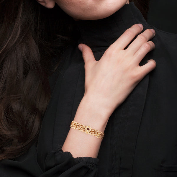 Pulsera de dos hilos eslabón tejido con aplicaciones y sintéticos en oro amarillo 14 kilates.
