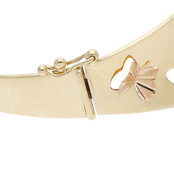 Pulsera de arillo calado motivo mariposas en oro tres tonos 14 kilates.