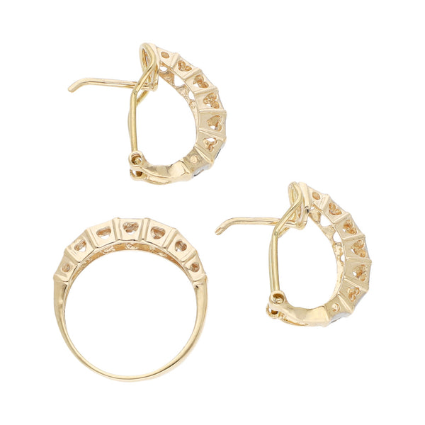 Juego de anillo y aretes platinados con sintéticos motivo corazón en oro amarillo 14 kilates.