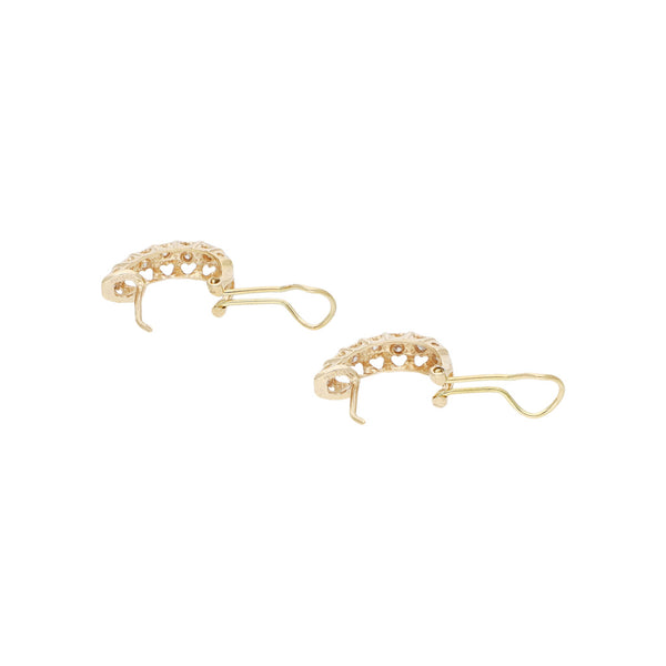 Juego de anillo y aretes platinados con sintéticos motivo corazón en oro amarillo 14 kilates.