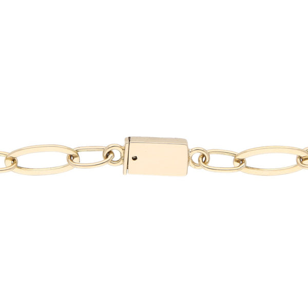 Pulsera eslabón cruzado motivo corazón en oro amarillo 12 kilates.