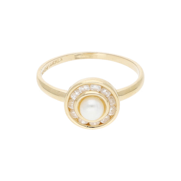 Anillo diseño especial con sintéticos en oro amarillo 14 kilates.