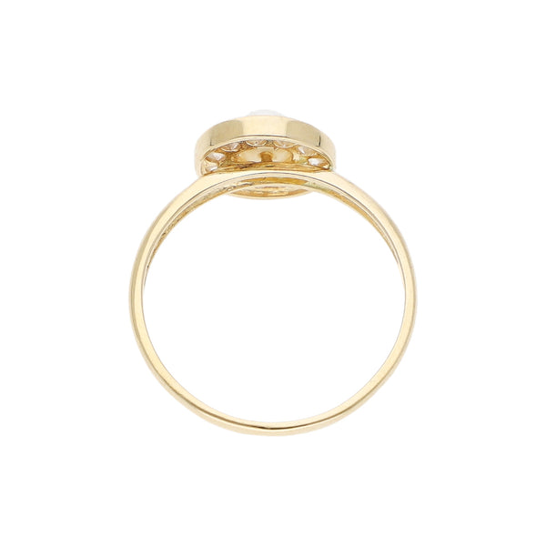 Anillo diseño especial con sintéticos en oro amarillo 14 kilates.