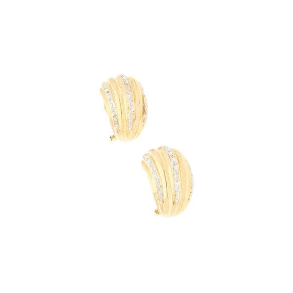 Aretes diseño especial con diamantes en oro amarillo 14 kilates.