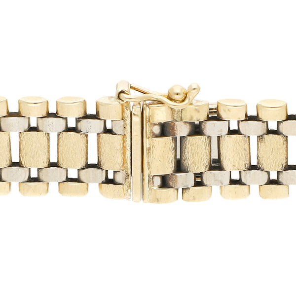 Pulsera eslabón articulado en oro dos tonos 14 kilates.