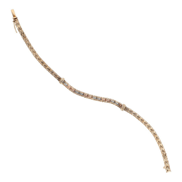 Pulsera eslabón boleado en oro tres tonos 14 kilates.