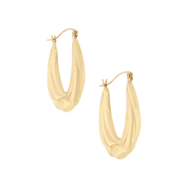 Arracadas huecas en oro amarillo 14 kilates.