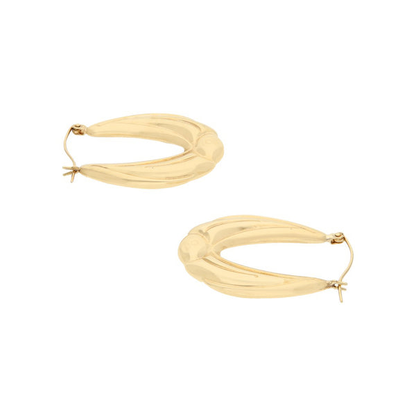 Arracadas huecas en oro amarillo 14 kilates.