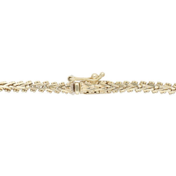 Pulsera eslabón boleado con aplicación en oro tres tonos 14 kilates.