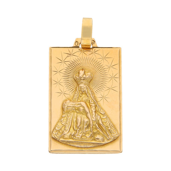 Medalla diseño especial motivo Virgen en oro amarillo 18 kilates.