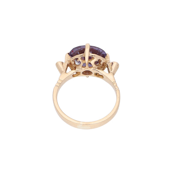 Anillo diseño especial con sintéticos en oro amarillo 12 kilates.