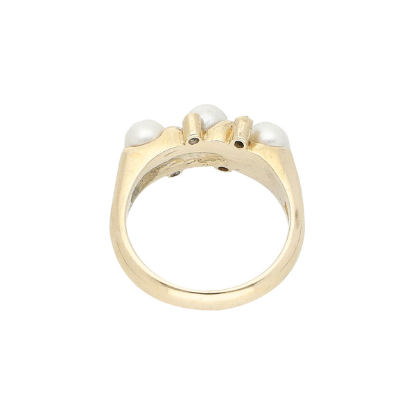 Anillo diseño especial con diamantes y perlas en oro amarillo 14 kilates.