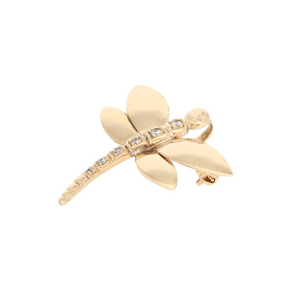 Prendedor diseño especial con sintétcos motivo libélula en oro amarillo 14 kilates.