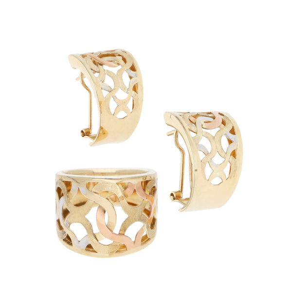 Juego de anillo y aretes calados en oro amarillo 14 kilates.