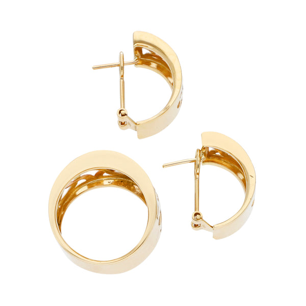 Juego de anillo y aretes calados en oro amarillo 14 kilates.