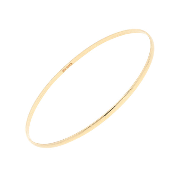 Pulsera de arillo lisa en oro amarillo 14 kilates.