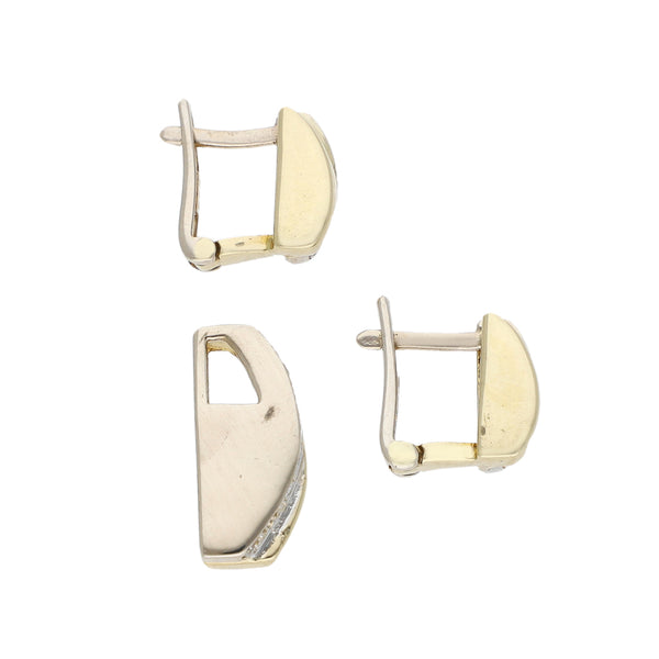 Juego de dije y aretes estilizados con sintéticos en oro dos tonos 14 kilates.