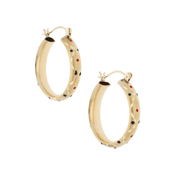 Arracadas labradas con esmalte en oro amarillo 14 kilates.