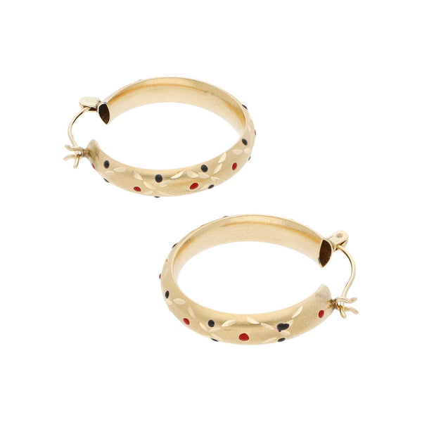 Arracadas labradas con esmalte en oro amarillo 14 kilates.