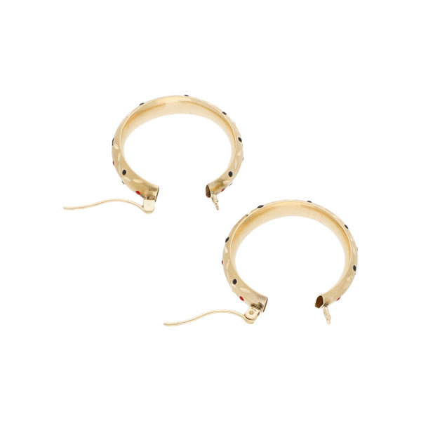 Arracadas labradas con esmalte en oro amarillo 14 kilates.
