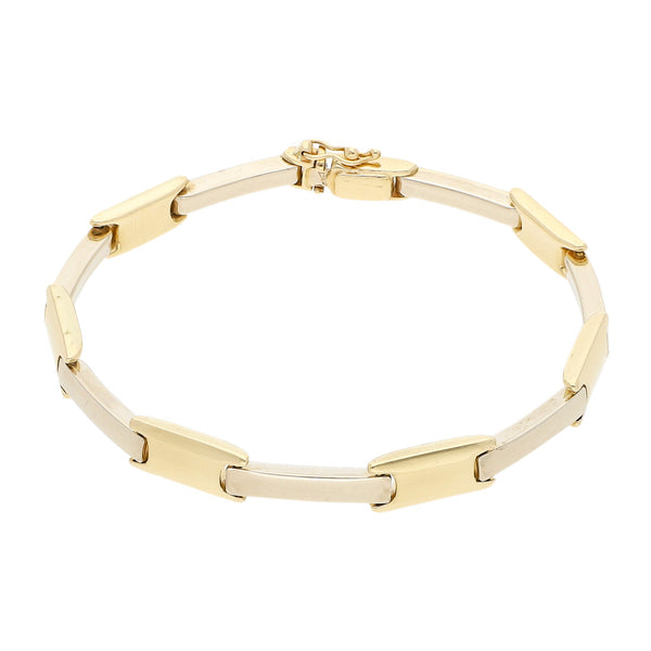 Pulsera eslabón articulado en oro dos tonos 14 kilates.