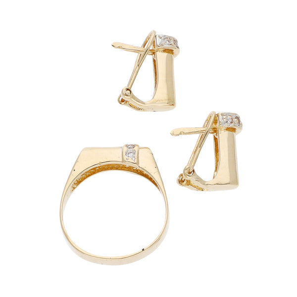 Juego de anillo y aretes diseño especial con circonias en oro amarillo 14 kilates.