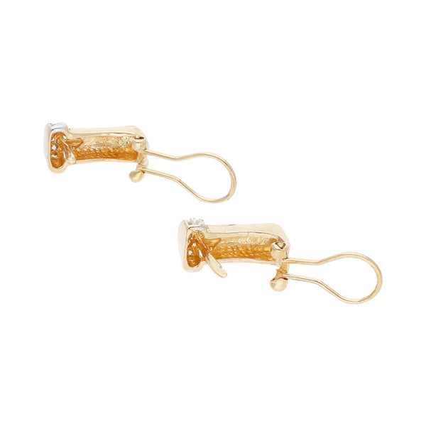 Juego de anillo y aretes diseño especial con circonias en oro amarillo 14 kilates.