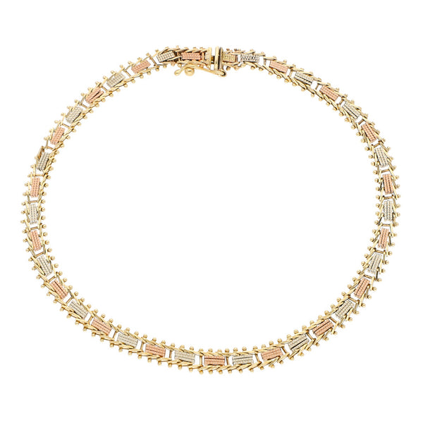 Pulsera eslabón boleado en oro tres tonos 14 kilates.
