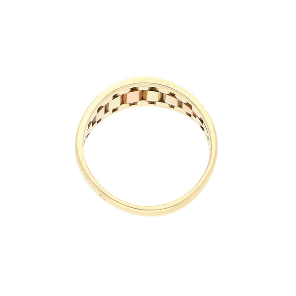 Anillo diseño especial en oro tres tonos 14 kilates.