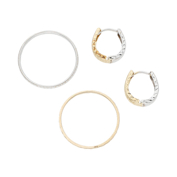 Dos argollas y aretes facetados en oro dos tonos 14 kilates.