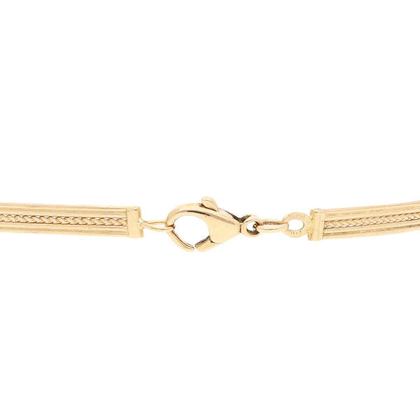 Pulsera eslabón articulado en oro amarillo 14 kilates.