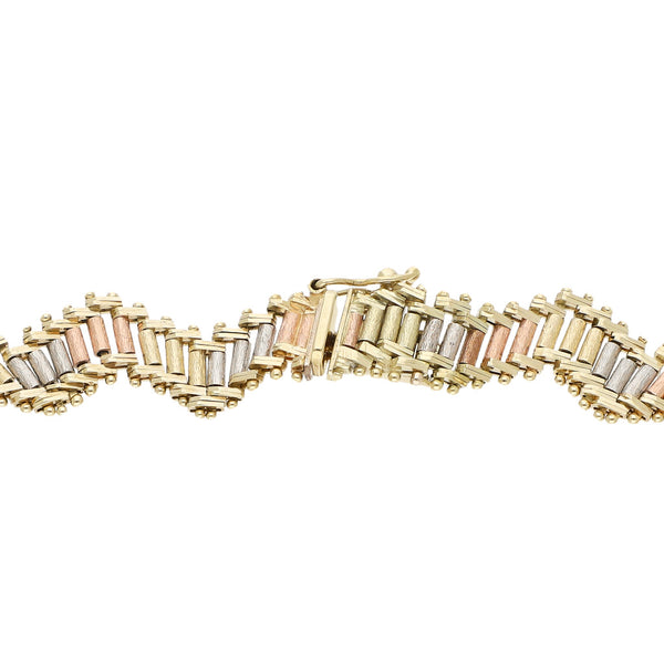 Pulsera eslabón boleado en oro tres tonos 14 kilates.