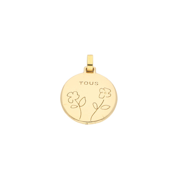 Dije diseño especial firma Tous en oro rosa 18 kilates.