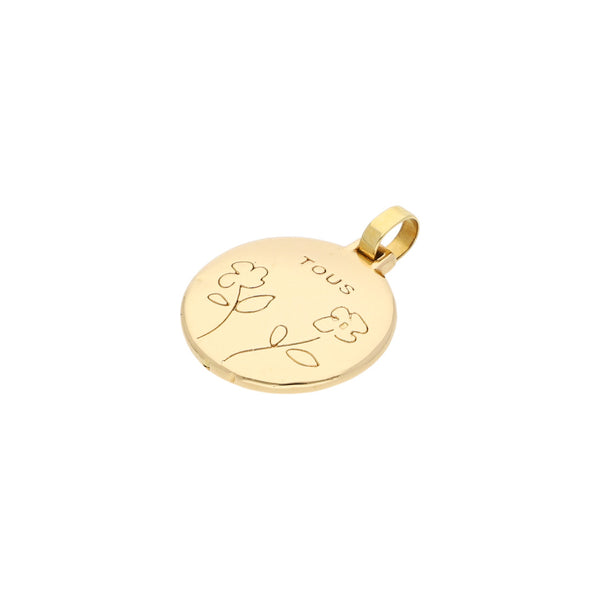 Dije diseño especial firma Tous en oro rosa 18 kilates.