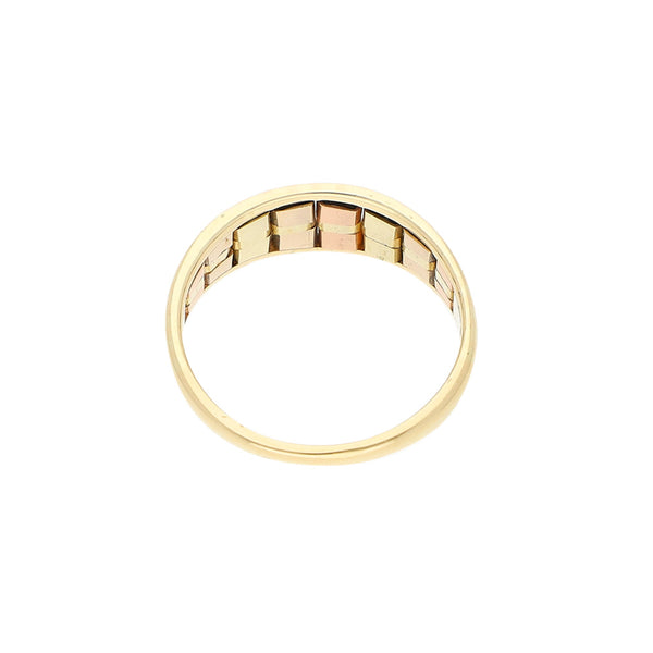 Anillo diseño especial en oro tres tonos 14 kilates.