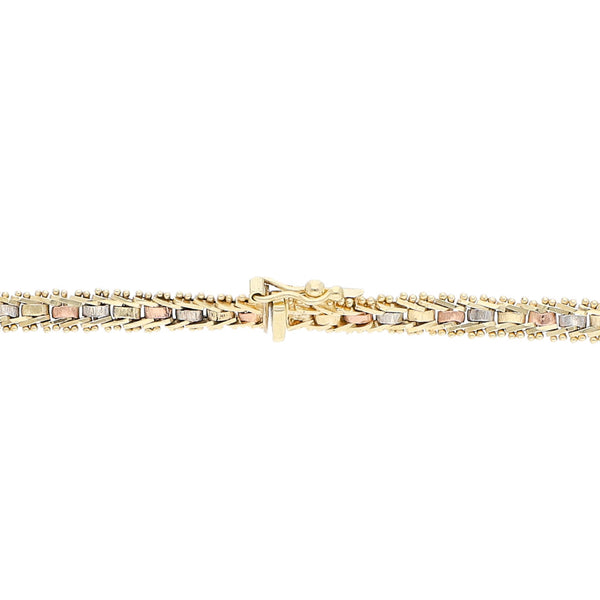 Pulsera eslabón boleado en oro tres tonos 14 kilates.