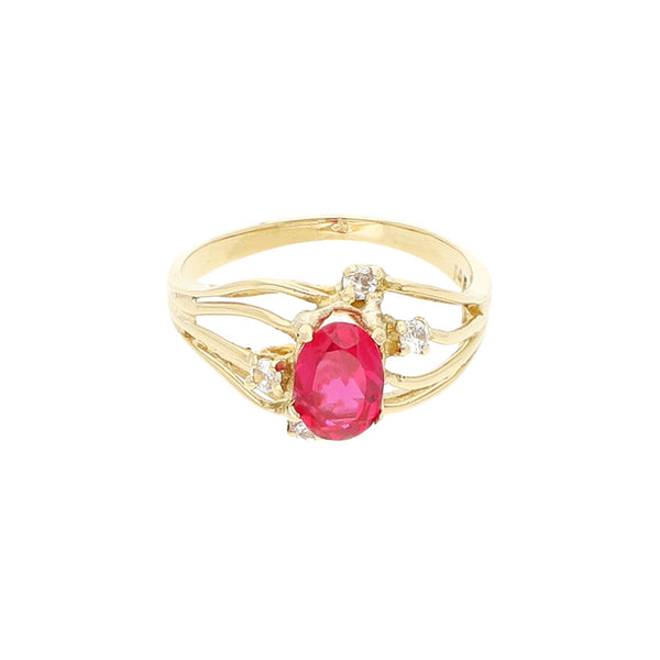 Anillo calado con sintéticos en oro amarillo 14 kilates.