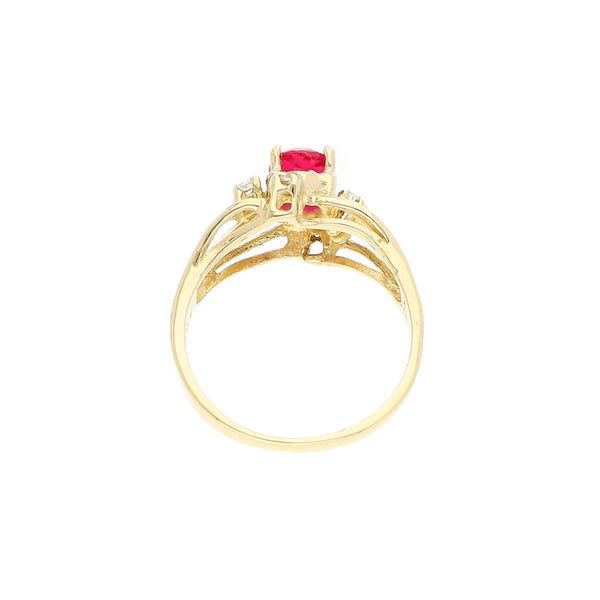 Anillo calado con sintéticos en oro amarillo 14 kilates.