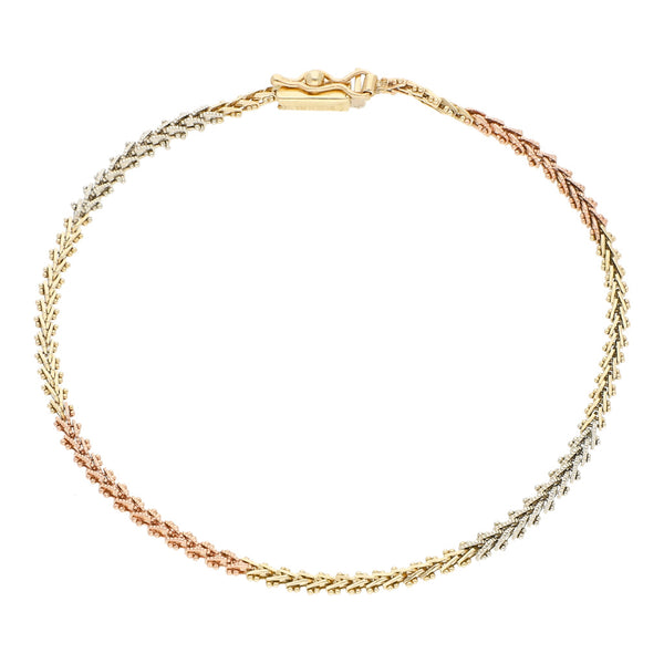 Pulsera eslabón boleado en oro tres tonos 14 kilates.