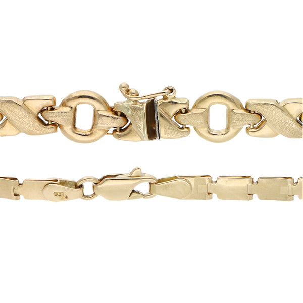 Dos pulseras eslabón laminado y XOXO en oro amarillo 14 kilates ...