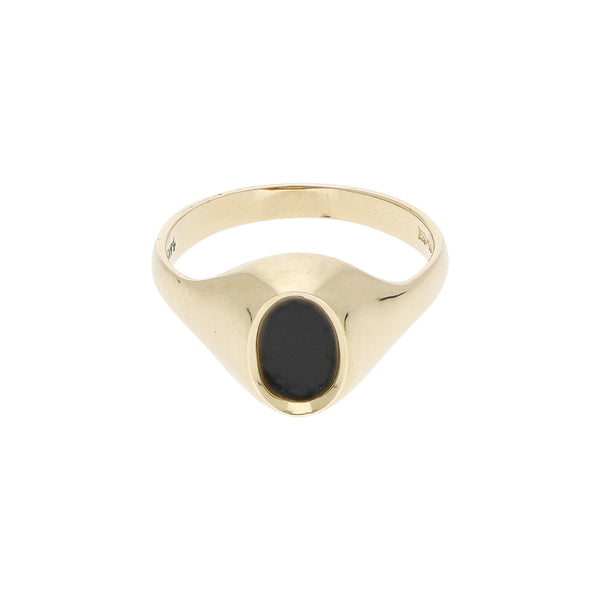 Anillo tipo sello con ónix en oro amarillo 14 kilates.